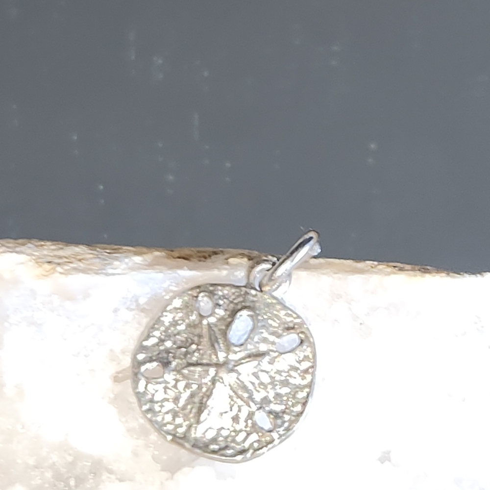 Women's 925 Sand Dollar Charm for a Bracelet or a Necklace.